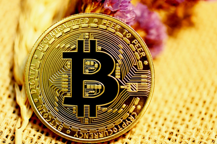 le-bitcoin-bat-son-record-historique-a-pres-de-70-000-dollars-que-reserve-lavenir